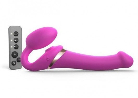 Ярко-розовый безремневой страпон Multi Orgasm Size M с клиторальной стимуляцией - Strap-on-me - купить с доставкой в Ростове-на-Дону
